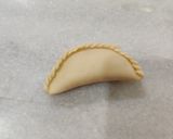 A picture of step 15 of Khoya Gujiya.