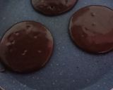 A picture of step 4 of Mini choco pancakes with tricolour frosting.