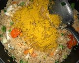 A picture of step 4 of Turmeric thai rice.