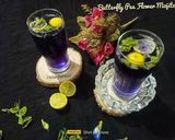 A picture of step 5 of Butterfly Pea Flower Mojito.