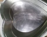 A picture of step 7 of Eggless Orange Cake.