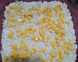 Foto del paso 3 de la receta: Arroz con elote y queso horneado