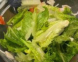 A picture of step 2 of Romaine lettuce salad with crab stick and homemade dressing.