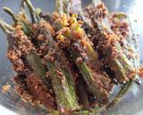 A picture of step 5 of Stuffed Kurmuri Bhindi Shallow fry.