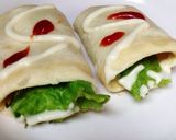 Foto langkah ke 2 dari resep Roti tawar gulung isi sosis simple(menu sarapan).
