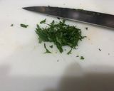Foto del paso 9 de la receta Rape y merluza en salsa de ajo y vino blanco