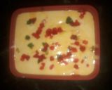 A picture of step 3 of Mango tutti frutti ice cream in rose petals icebowl.