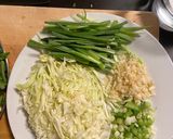 A picture of step 1 of Saucy Chicken Chowmein Indian Chinese Style.