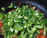 A picture of step 4 of Tomato with chillies.