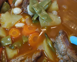 Foto del paso 3 de la receta: Guiso de costillas adobadas con legumbres y verduras