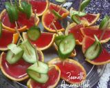 A picture of step 3 of Jello Cucumber Boats.