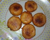A picture of step 9 of Laddu stuffing bread puwa.