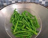 Foto langkah ke 1 dari resep Tumis Kacang Panjang Bawang Putih.