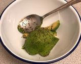 A picture of step 3 of Paprika eggs. Turmeric Sourdough. Black pudding crumb. Smashed avocado.