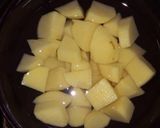 A picture of step 4 of Mango juice and Potato Curry.