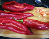 Foto del paso 9 de la receta: Pimientos rellenos con bacalao y arroz sobre salsa de tomate
