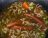 A picture of step 6 of Sunday Maggi Dhamaka Lunch #Maggipizza #Maggisizzler #MaggicabbageRolls #MaggiManchurian #MaggiSoup.