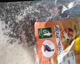 A picture of step 1 of Coconut laddu.
