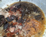 A picture of step 1 of Assorted meat jollof.
