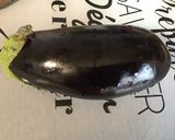 Une image de l'étape 1 de Chipolatas au curry d'aubergine et tomates.