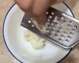 A picture of step 2 of Cheesy garlic bread.