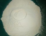 A picture of step 2 of Lemon flavored Ugali cake with sultanas.