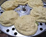 A picture of step 10 of Dhokla in idli version stuffed with cheezee rice patty.