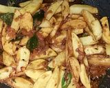 A picture of step 4 of Spicy fried potato sabzi.