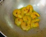 A picture of step 1 of Kochu Pata Chingri.