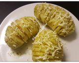 Hình bước làm 4 của món Khoai tây bỏ lò nướng bơ tỏi phô mai