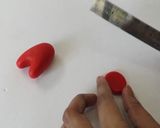 A picture of step 7 of Vickys 'Among Us' Cake Decoration Idea.