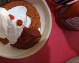 A picture of step 4 of Fried yam coated with egg and spicy fry sauce.