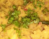 A picture of step 4 of South Indian cuisine platter(dosa,sambar,chutney,potato veggie).