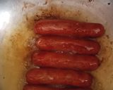 A picture of step 3 of Sumptuos Fried Beef Sausages using very little oil.