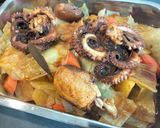 Foto del paso 6 de la receta: Pulpo al horno con col