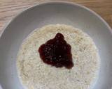 Porridge with blueberries and strawberry jam