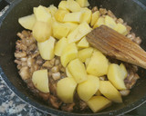Foto del paso 4 de la receta: Sèpia amb patates a l'all negre