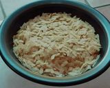 A picture of step 3 of Aval puttu -Sweet dessert with flattened rice.
