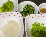 A picture of step 2 of New Onion and Cucumber Salad.
