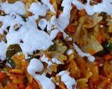 A picture of step 5 of Farfalle Pasta with cheese & Schezwan sauce.