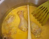 A picture of step 5 of Chicken in coconut and turmeric sauce.