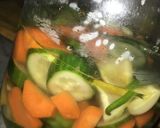 صورة لخطوة 2 من وصفة مخلل جزر وخيار 🥕🥒🌶