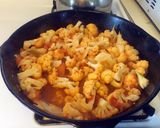 A picture of step 5 of Cauliflower and Tomato Stir-Fry.