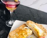 A picture of step 4 of Egg-in-a-hole plus Cheese.