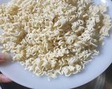 A picture of step 5 of Veg. Cheese Noodles mug.