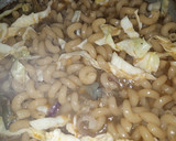 A picture of step 6 of Twist macaroni jollof.