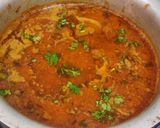 A picture of step 10 of Kolhapuri Chickan masala and curry.