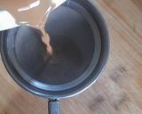 A picture of step 4 of Saffron cardamom tea.