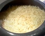A picture of step 2 of Brown rice with chana masala.