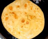 A picture of step 2 of Paratha with egg omelette.